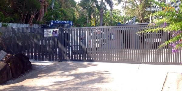 The Monument - Powder coated sliding gate with vertical slats