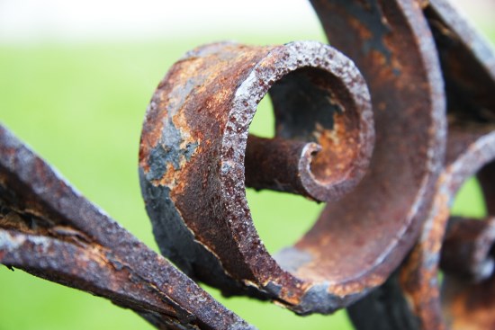 a rusty steel gate in detail